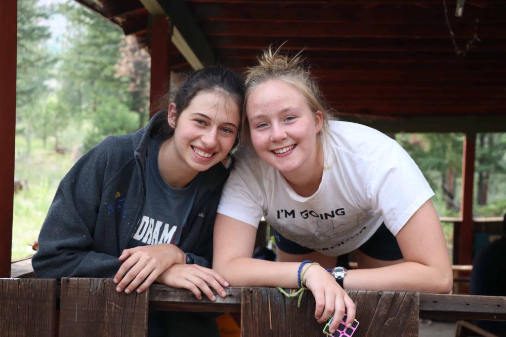 two smiling teens